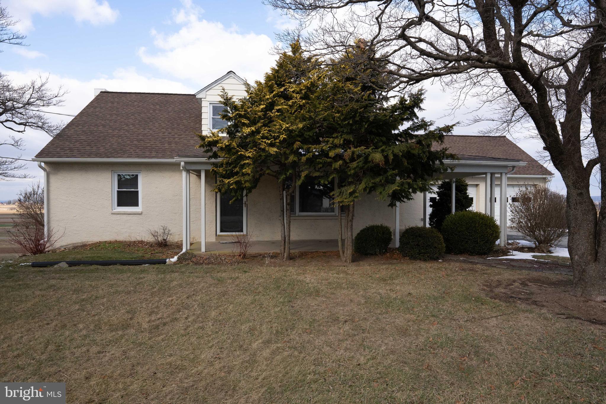 561 Georgetown Road Ronks, PA 17572 - Photo 19 of 34 a front view of a house with a garden