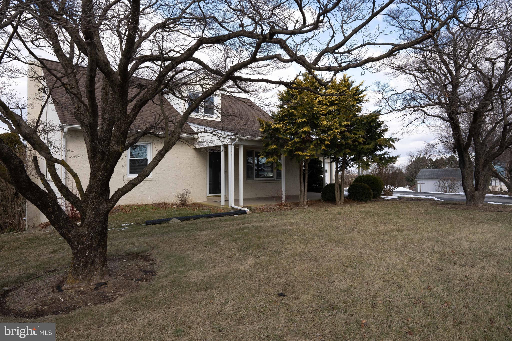 561 Georgetown Road Ronks, PA 17572 - Photo 21 of 34 a view of a house with a yard and large trees