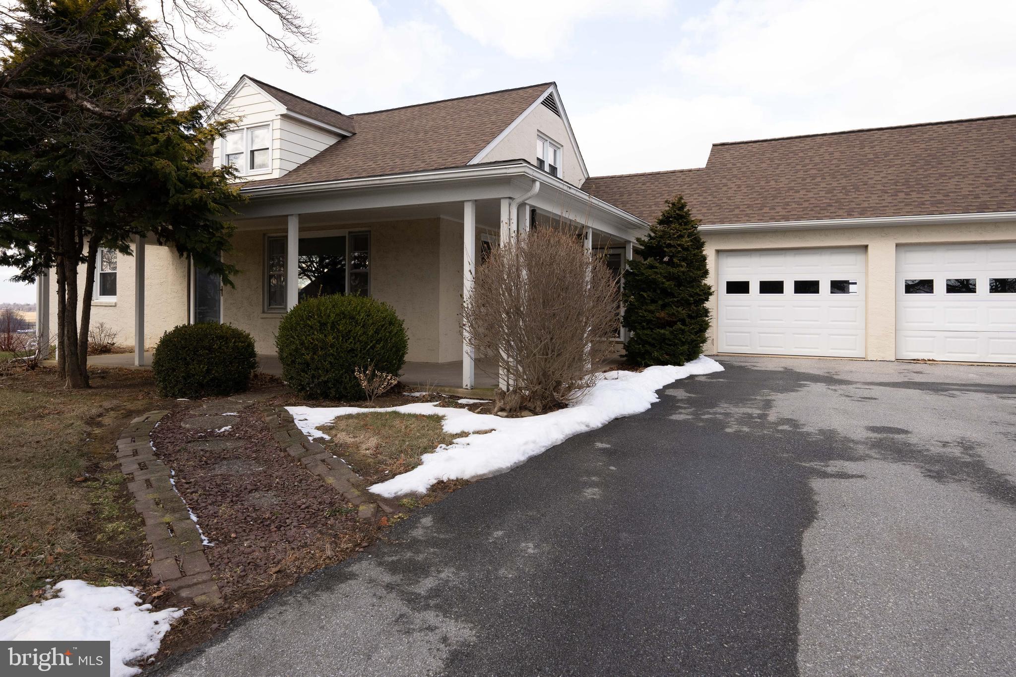 561 Georgetown Road Ronks, PA 17572 - Photo 23 of 34 a view of a white house with a outdoor space