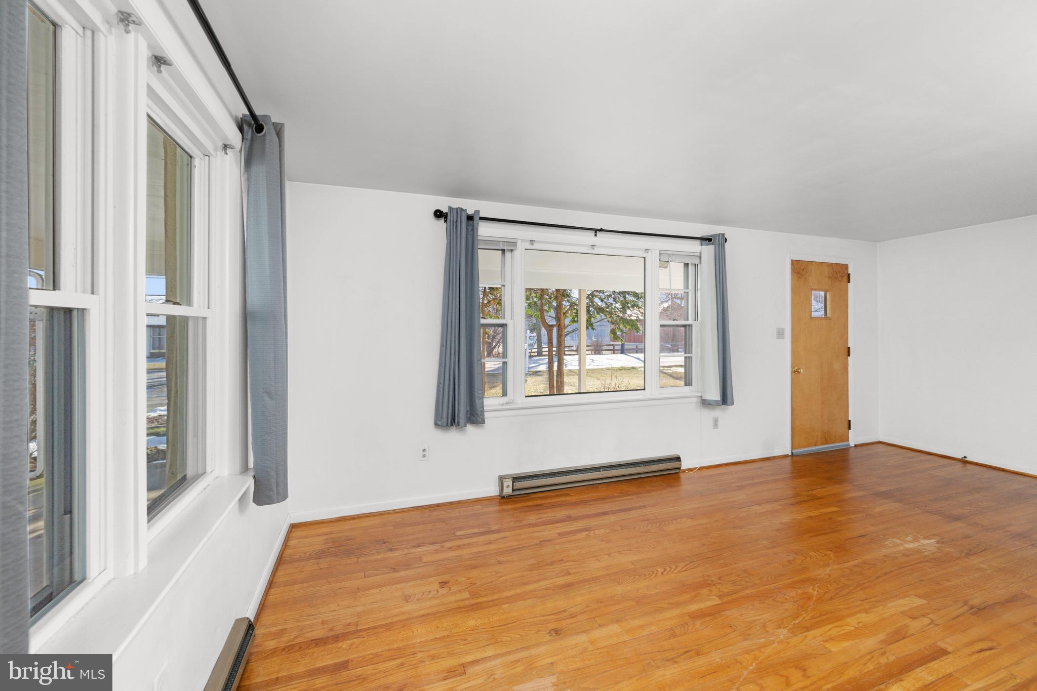 561 Georgetown Road Ronks, PA 17572 - Photo 7 of 34 a view of an empty room with a window