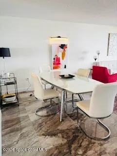 a bedroom with a bed and cabinets