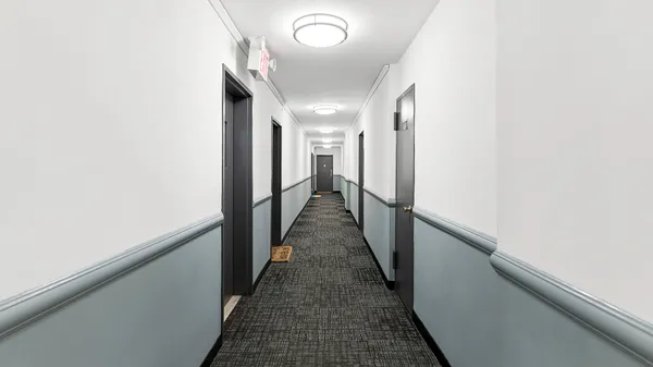 a view of hallway with stairs