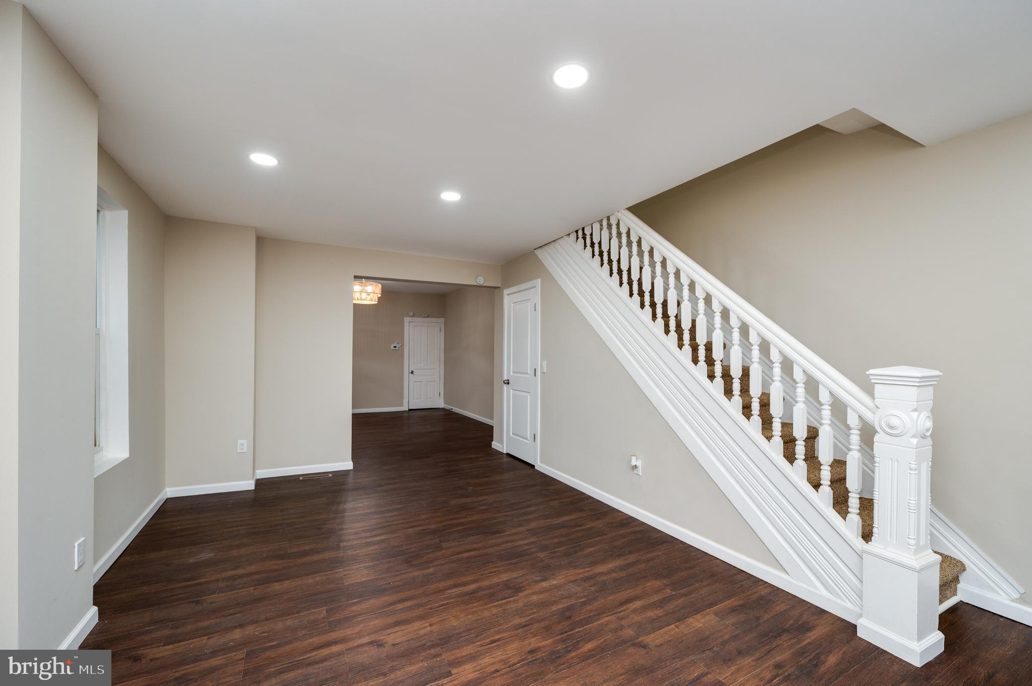 137 Elm Street Reading, PA 19601 - Photo 11 of 49 a view of an entryway with wooden floor