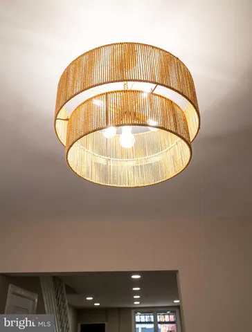 a kitchen with stainless steel appliances a refrigerator sink and cabinets