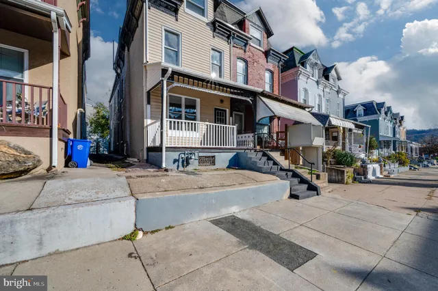 a view of a building with a street