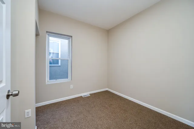 an empty room with a window