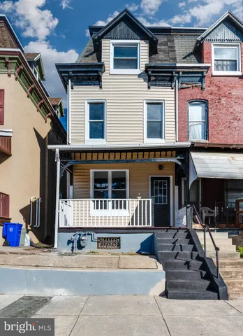 a view of a building with entrance gate