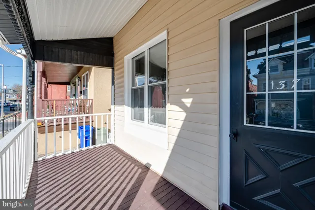 a view of a house with a porch