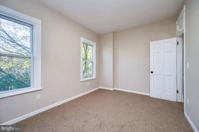 an empty room with a window