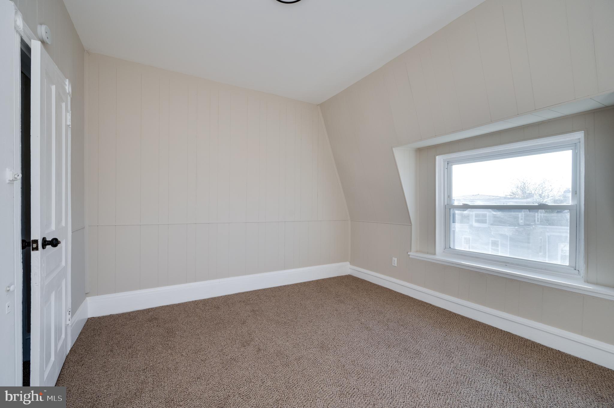 137 Elm Street Reading, PA 19601 - Photo 43 of 49 an empty room with a window