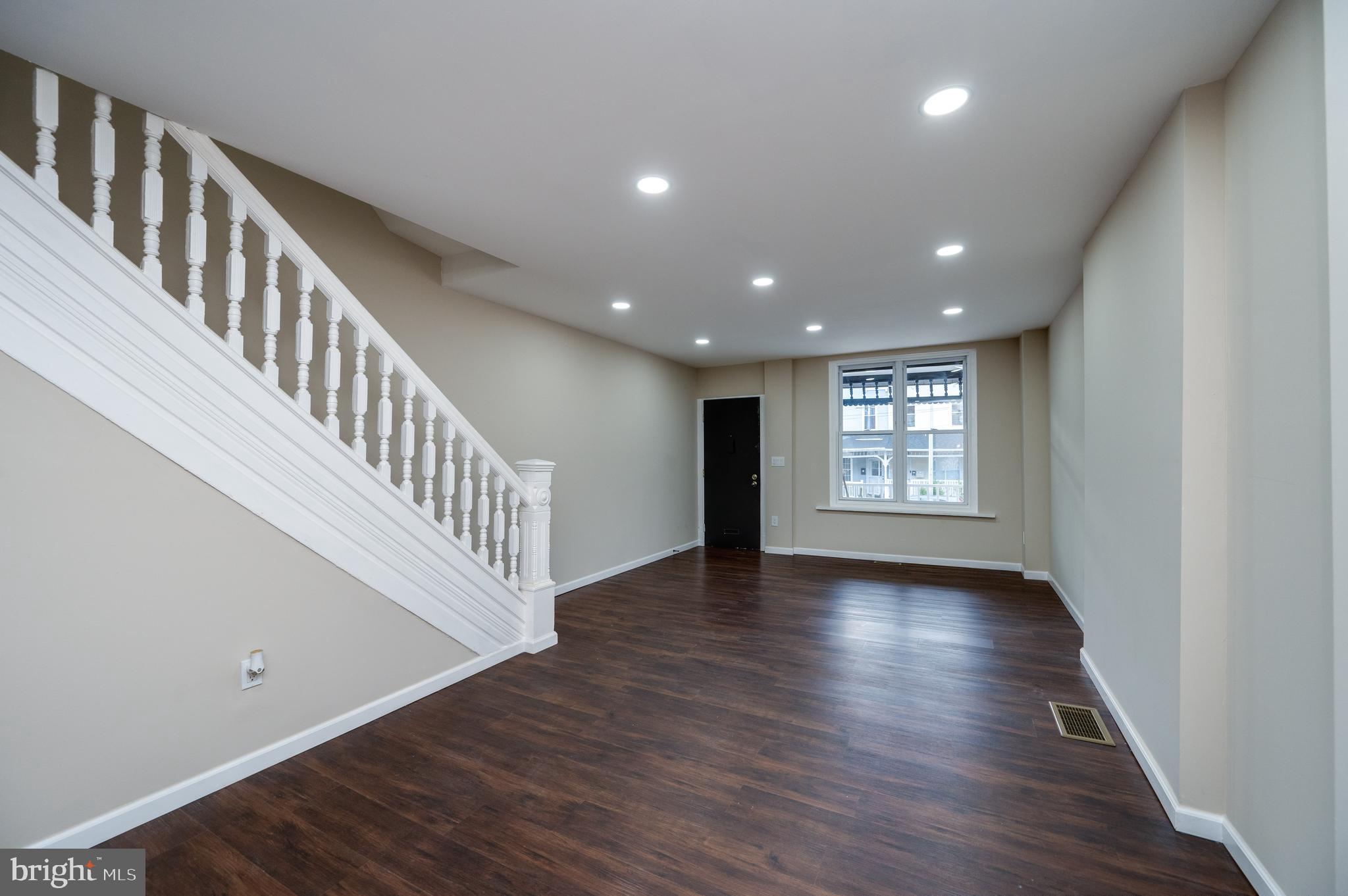 137 Elm Street Reading, PA 19601 - Photo 6 of 49 a view of an entryway with wooden floor