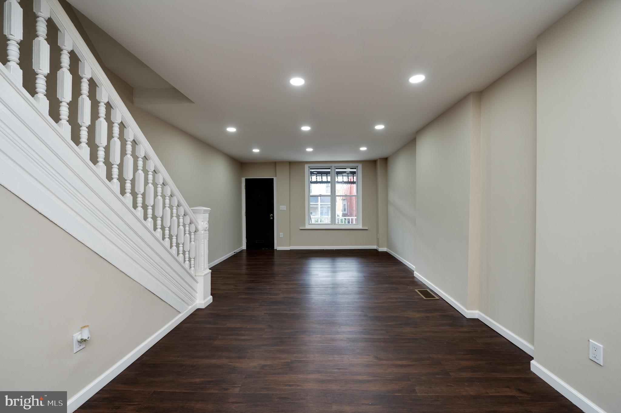137 Elm Street Reading, PA 19601 - Photo 8 of 49 a view of an entryway with wooden floor
