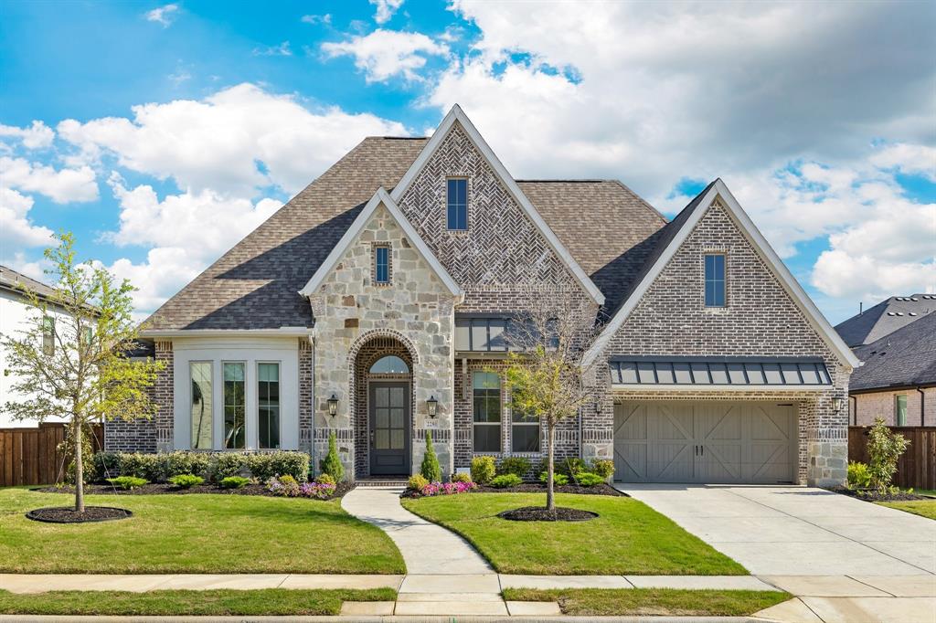 2280 Shady Hill Drive Prosper, TX 75078 - Photo 1 of 1 a front view of a house with a yard