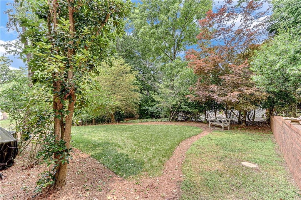 2626 Club Drive Gainesville, GA 30506 - Photo 31 of 71 a view of a field with trees in the background