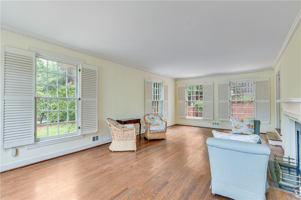 2626 Club Drive Gainesville, GA 30506 - Photo 34 of 71 a living room with furniture and a wooden floor