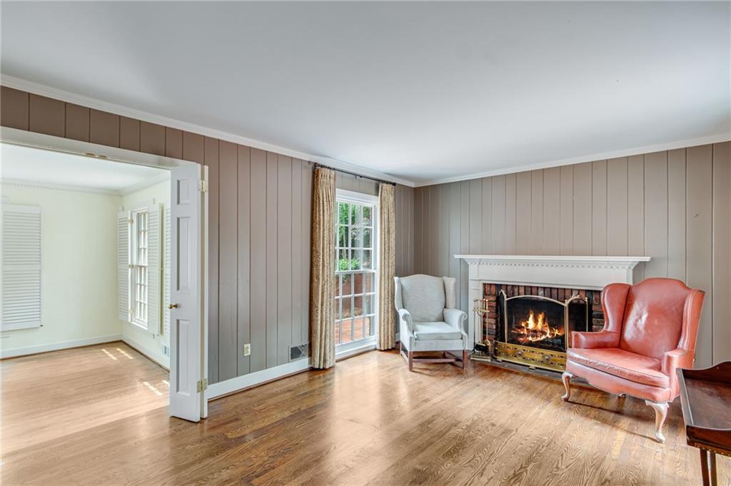 2626 Club Drive Gainesville, GA 30506 - Photo 36 of 71 a living room with furniture and a fireplace