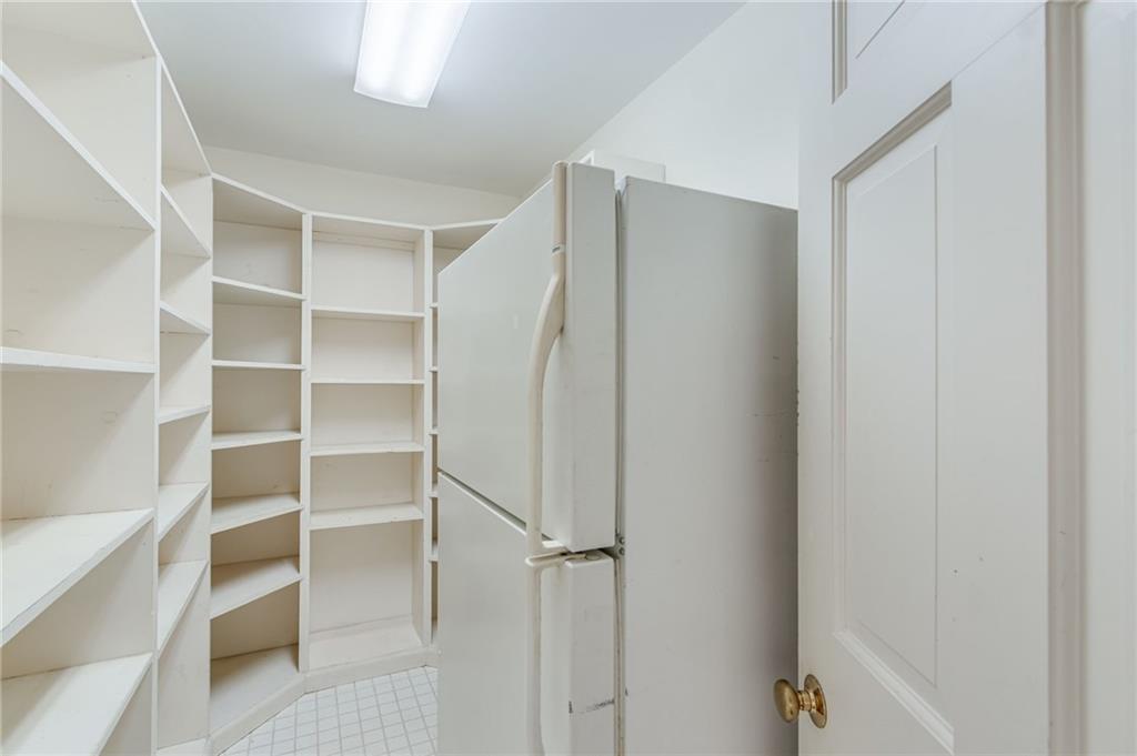 2626 Club Drive Gainesville, GA 30506 - Photo 51 of 71 a view of walk in closet with empty racks