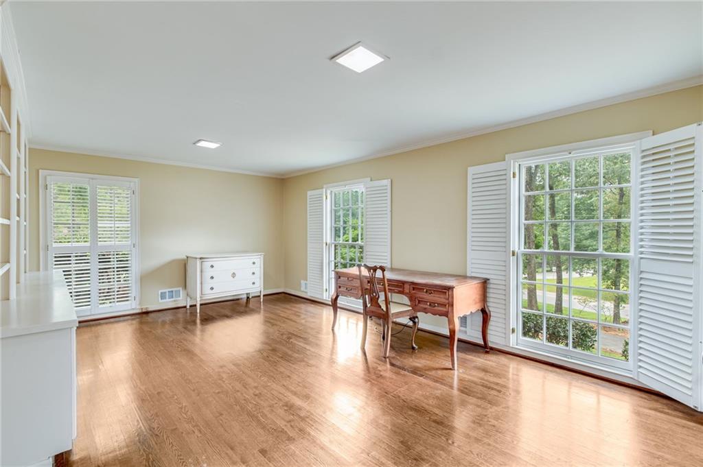 2626 Club Drive Gainesville, GA 30506 - Photo 52 of 71 a view of a room with furniture wooden floor and windows
