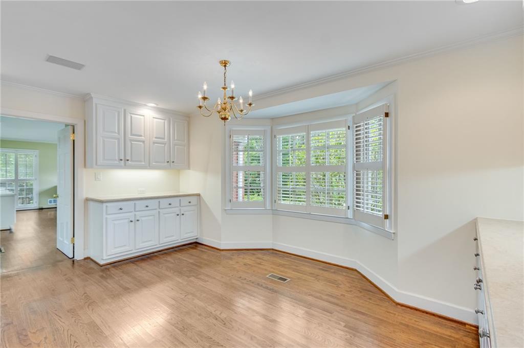 2626 Club Drive Gainesville, GA 30506 - Photo 54 of 71 a spacious bathroom with a granite countertop sink a mirror and a bathtub