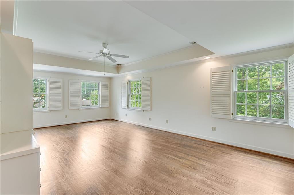 2626 Club Drive Gainesville, GA 30506 - Photo 55 of 71 an empty room with wooden floor and windows