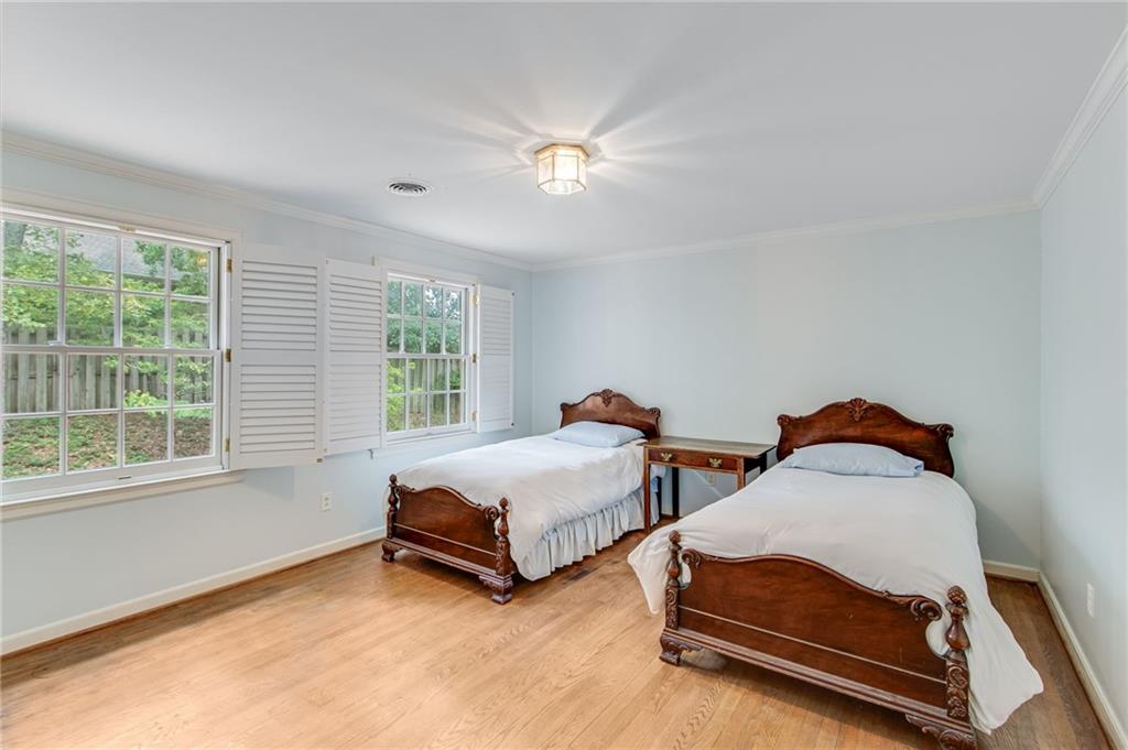 2626 Club Drive Gainesville, GA 30506 - Photo 62 of 71 a spacious bedroom with two beds and window