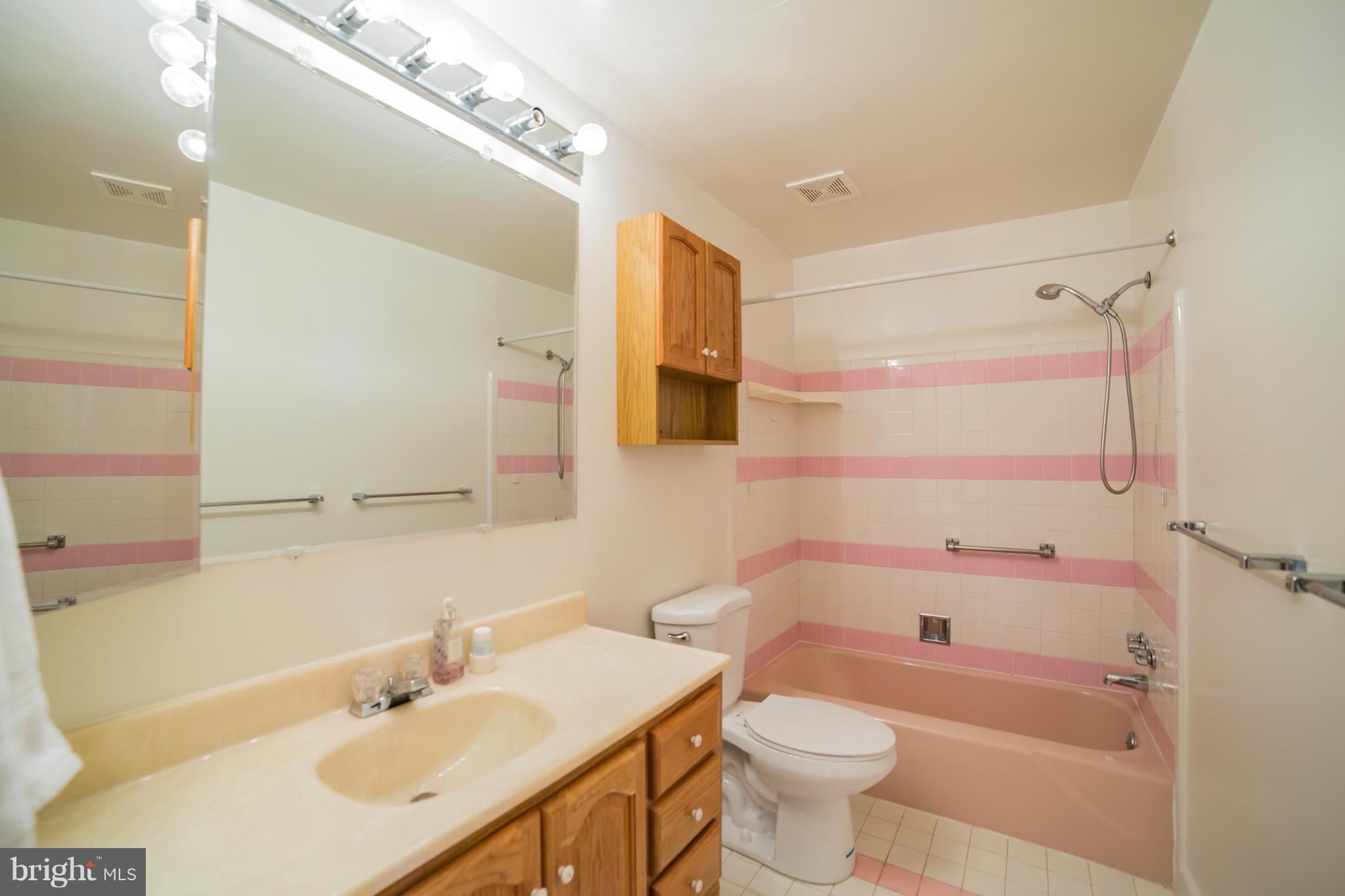 11608 Gilsan Street Silver Spring, MD 20902 - Photo 14 of 28 Full bathroom off main level hallway