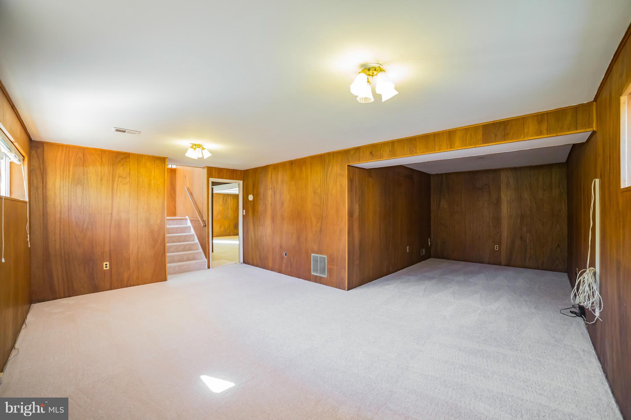 11608 Gilsan Street Silver Spring, MD 20902 - Photo 20 of 28 Recreation room towards foyer