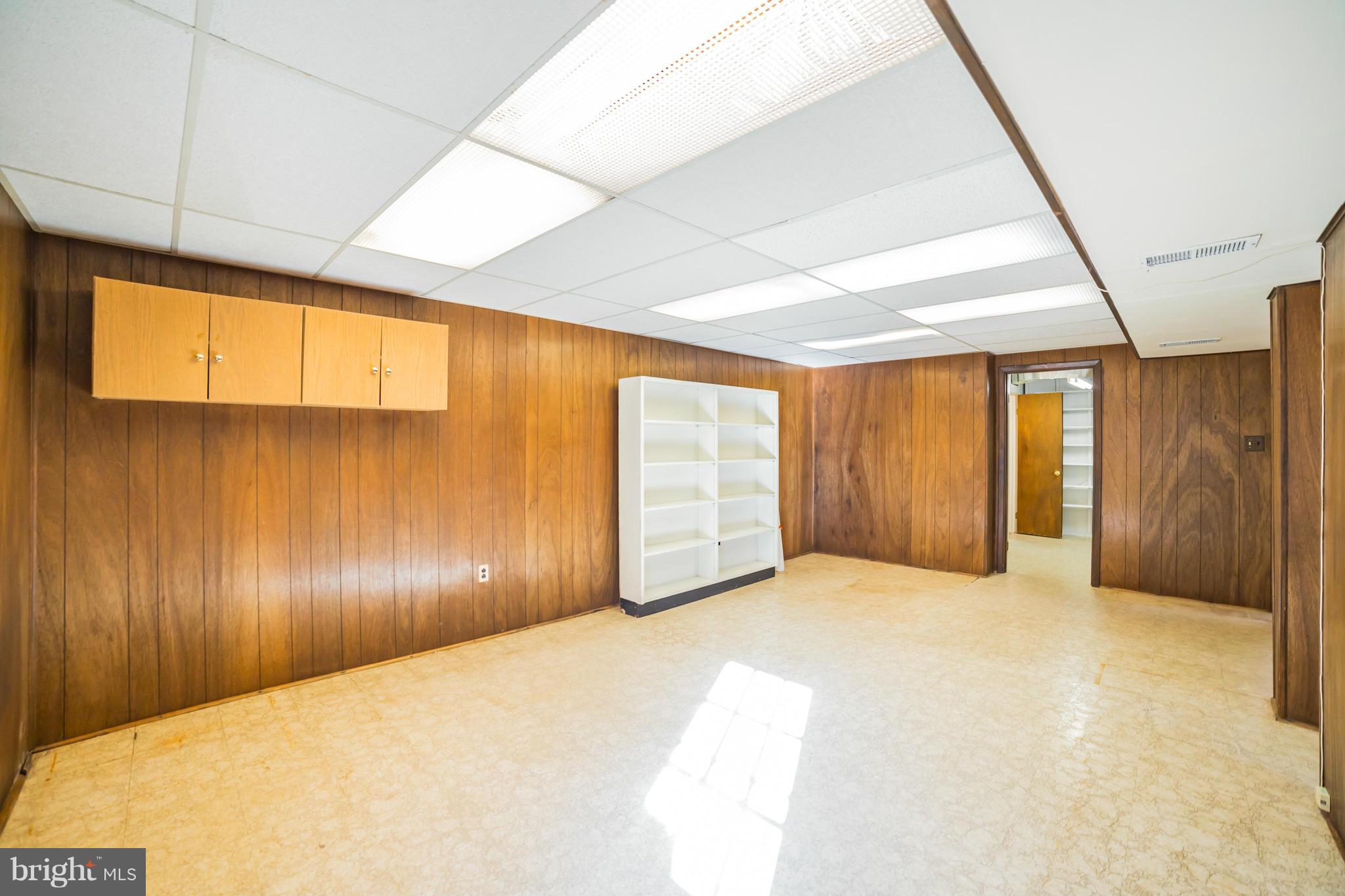 11608 Gilsan Street Silver Spring, MD 20902 - Photo 22 of 28 Workshop/office/storage towards laundry