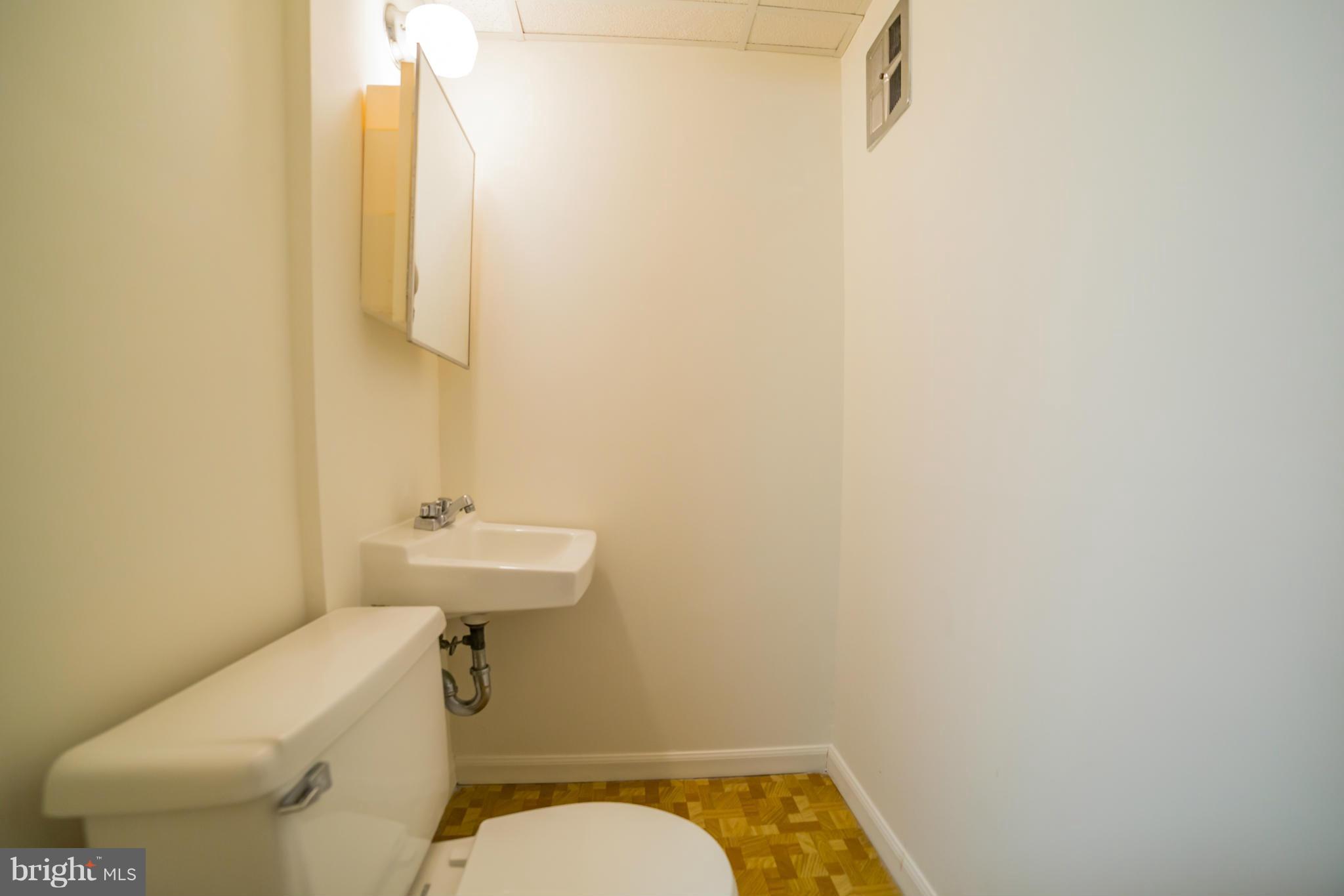 11608 Gilsan Street Silver Spring, MD 20902 - Photo 23 of 28 Powder room in the basement