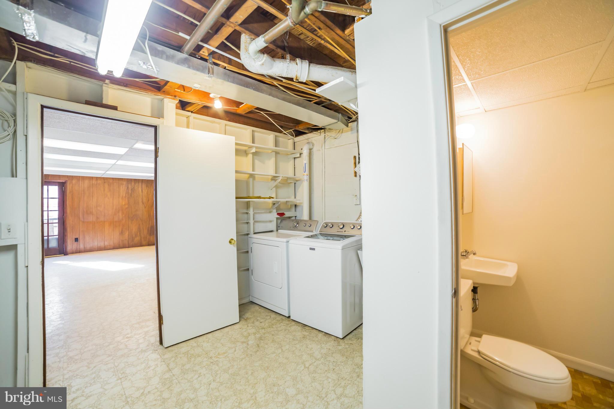 11608 Gilsan Street Silver Spring, MD 20902 - Photo 24 of 28 Basement laundry room and powder room
