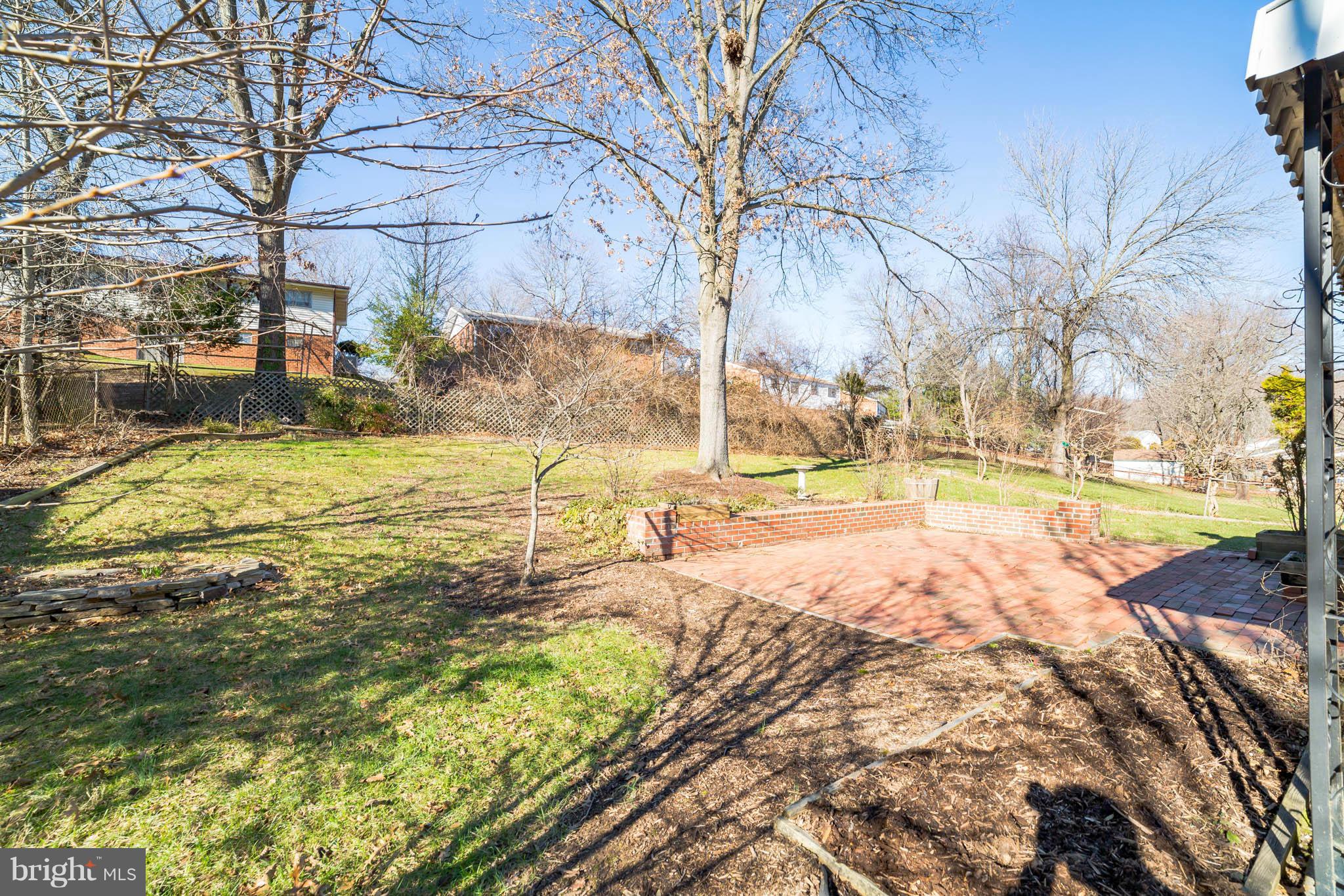 11608 Gilsan Street Silver Spring, MD 20902 - Photo 26 of 28 Private, fenced backyard and patios