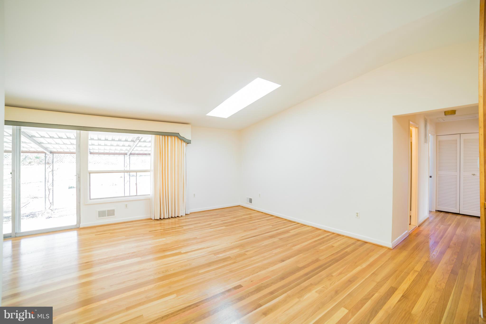 11608 Gilsan Street Silver Spring, MD 20902 - Photo 9 of 28 Living room towards bedrooms