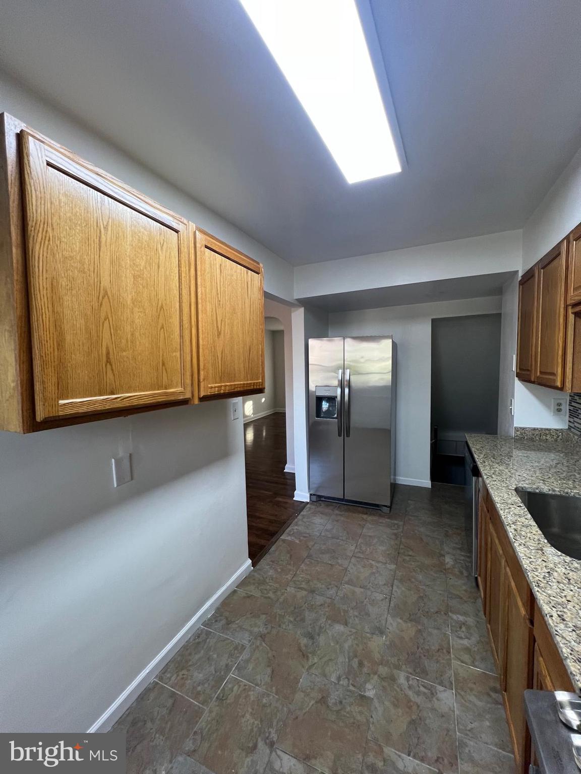 603 Braeside Road Baltimore, MD 21229 - Photo 2 of 30 a view of a kitchen with a sink and cabinet