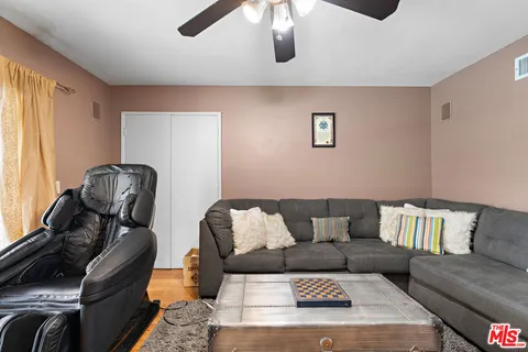 a living room with furniture and a couch