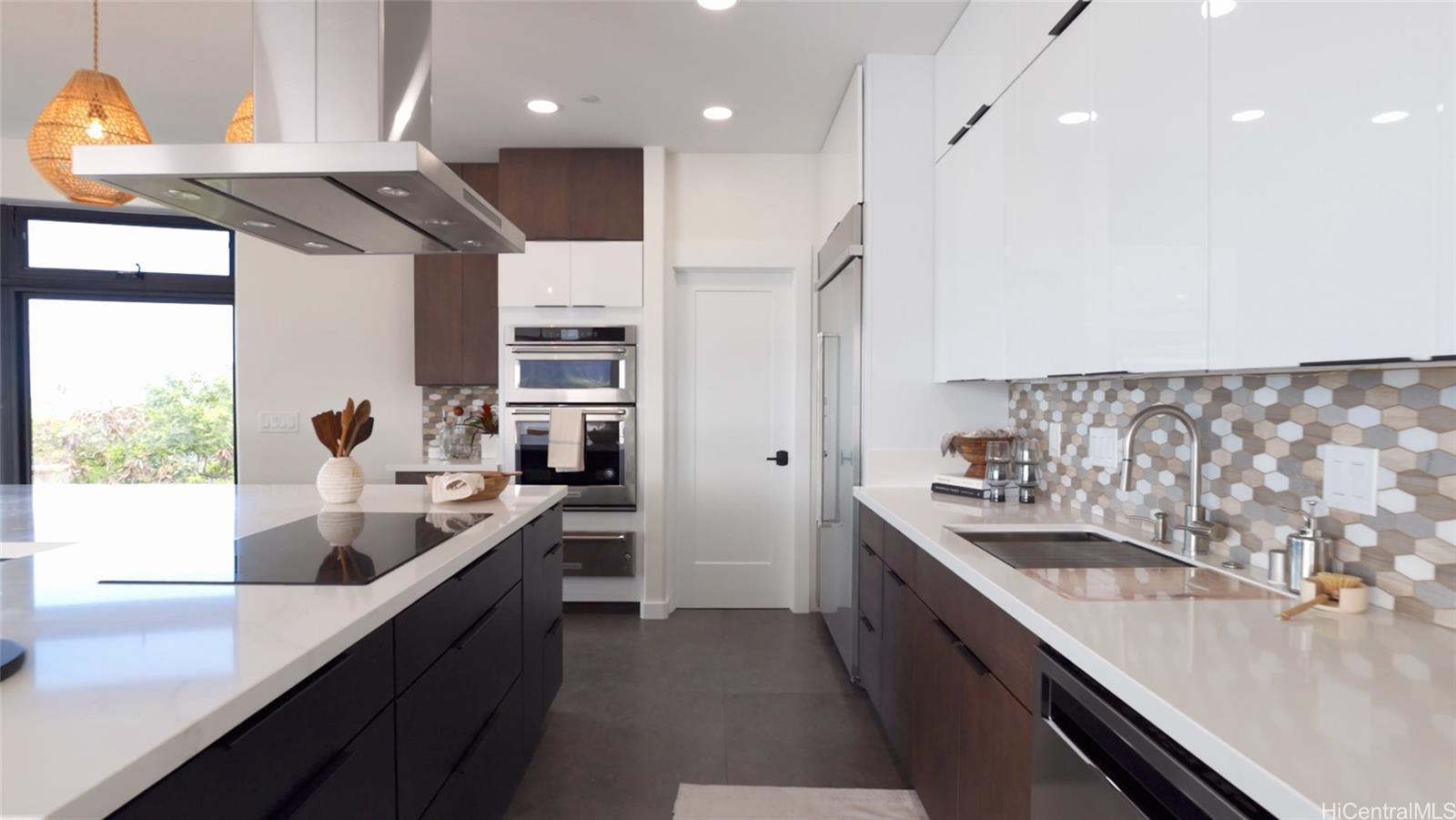 44-652 Kaneohe Bay Drive, Unit A Kaneohe, HI 96744 - Photo 12 of 25 a large kitchen with stainless steel appliances lots of counter top space