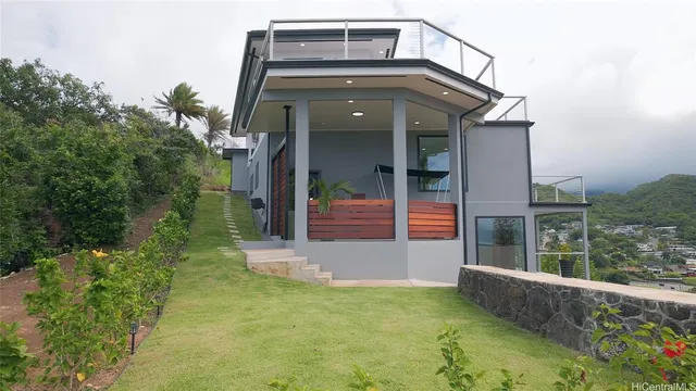 front view of a house with a yard