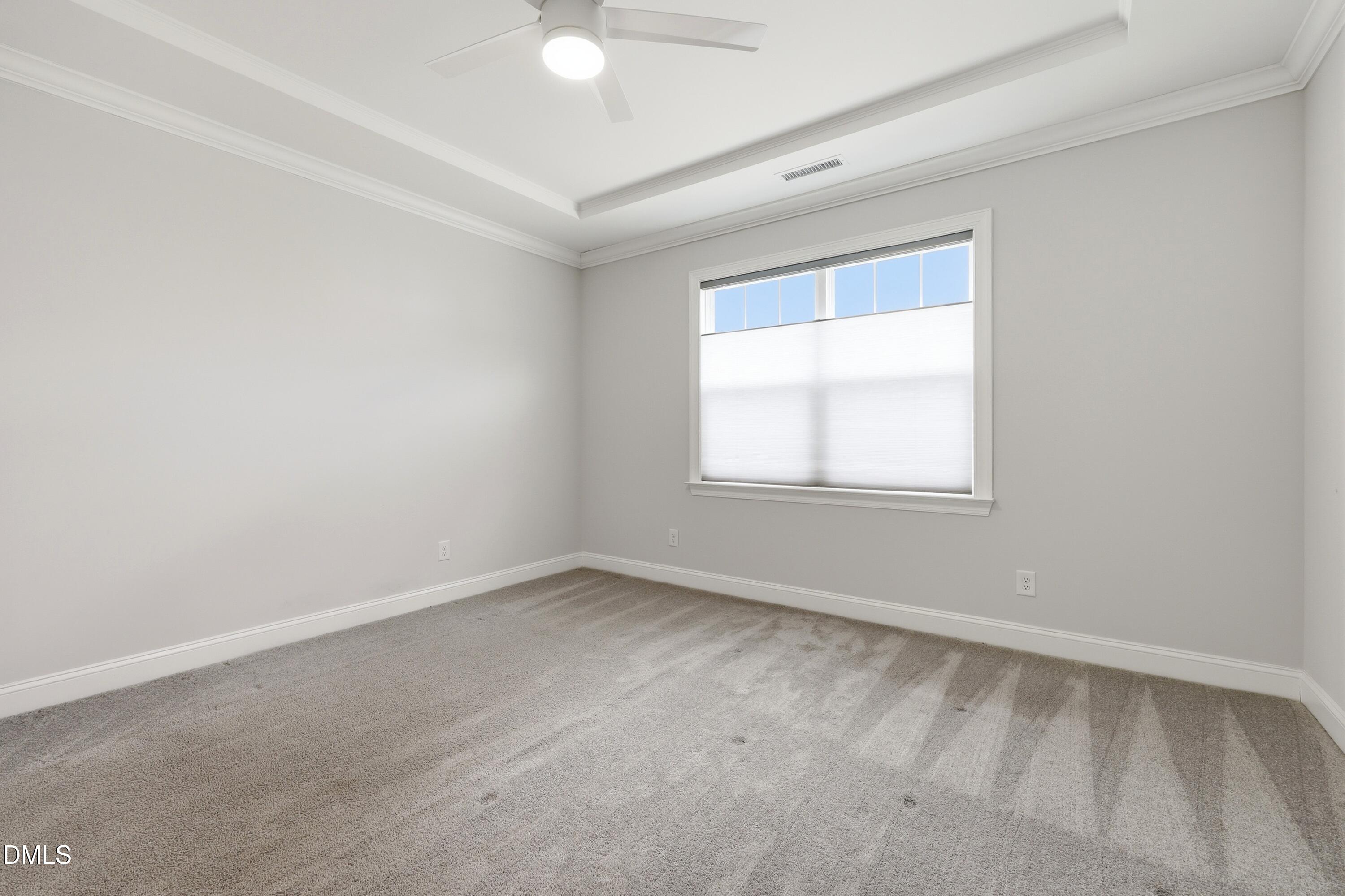 289 English Violet Lane Raleigh, NC 27610 - Photo 19 of 40 an empty room with a window