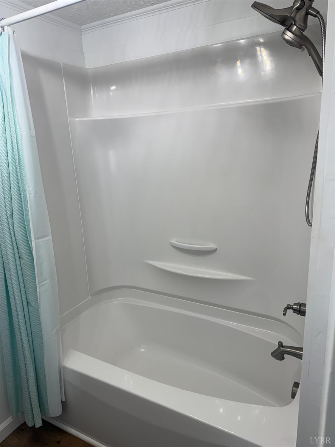 1046 Clarks Road Rustburg, VA 24588 - Photo 7 of 19 a bathroom with a bathtub