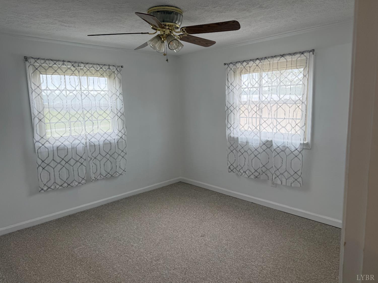1046 Clarks Road Rustburg, VA 24588 - Photo 8 of 19 a view of room with window and ceiling fan