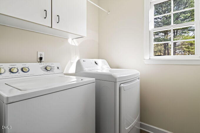 6733 Oviedo Drive Raleigh, NC 27603 - Photo 15 of 33 a utility room with dryer and washer