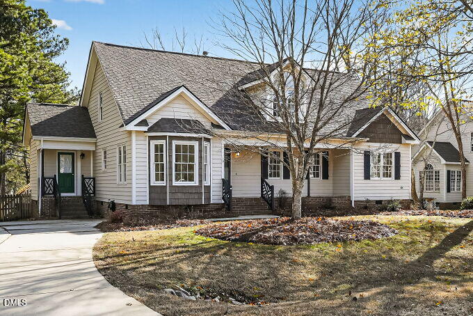 6733 Oviedo Drive Raleigh, NC 27603 - Photo 2 of 33 a front view of a house with a yard