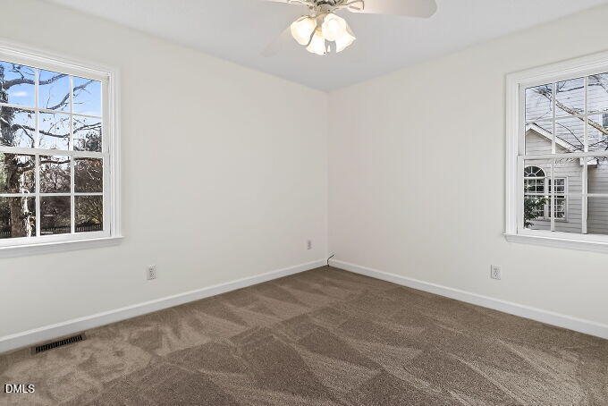 6733 Oviedo Drive Raleigh, NC 27603 - Photo 23 of 33 a view of an empty room with a window