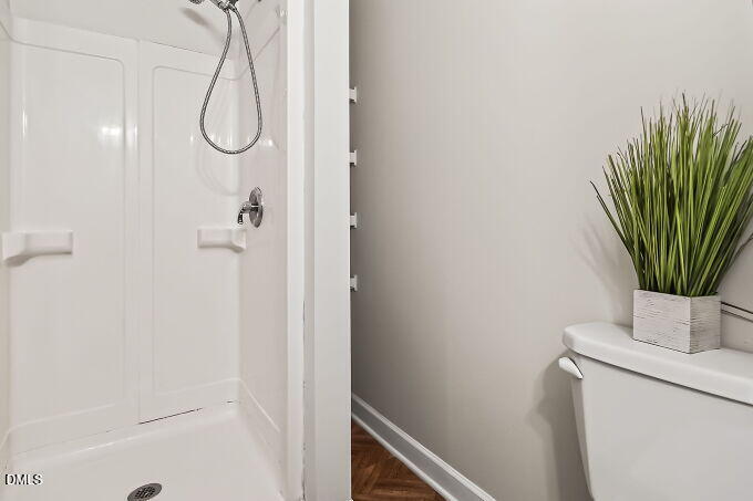 6733 Oviedo Drive Raleigh, NC 27603 - Photo 29 of 33 a bathroom with a shower