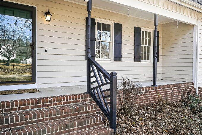 6733 Oviedo Drive Raleigh, NC 27603 - Photo 3 of 33 a view of a house with a door