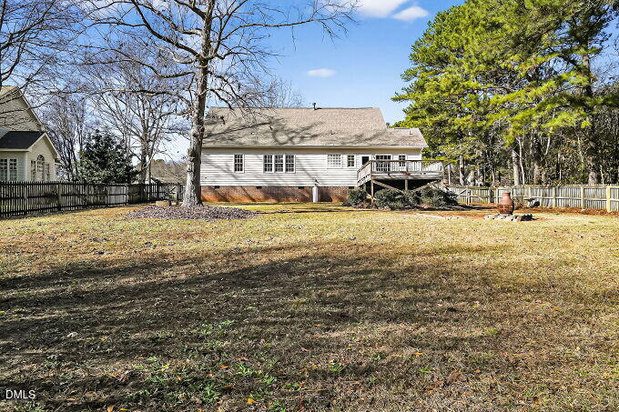 6733 Oviedo Drive Raleigh, NC 27603 - Photo 33 of 33 a view of a yard with a house