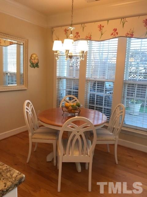 3616 Lion Ridge Court Raleigh, NC 27612 - Photo 4 of 29 Sit down, relax, enjoy a cup of coffee in your cozy breakfast room. Plenty of room, perfect spot to sit and watch the some of the most beautiful bird species found in NC.