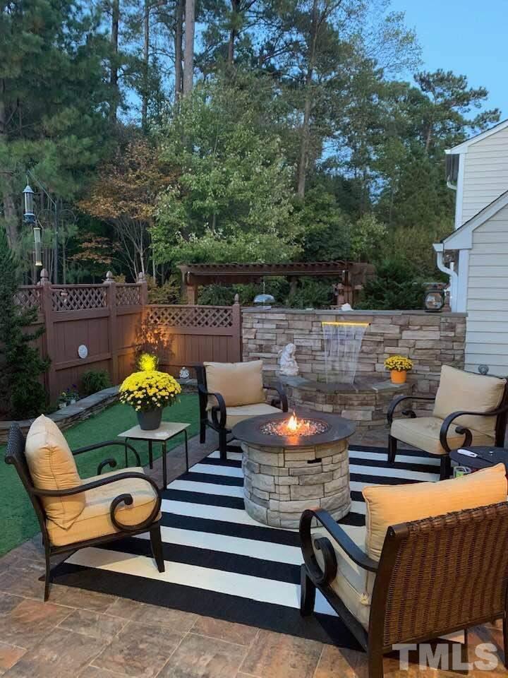 3616 Lion Ridge Court Raleigh, NC 27612 - Photo 8 of 29 You will not believe you are in the city! This patio area gives you the best of both worlds... outside to enjoy nature, the beautiful sunshine, and fresh air. Yet, the enclosure provides the perfect area for privacy.
