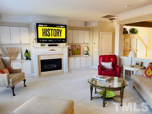 3616 Lion Ridge Court Raleigh, NC 27612 - Photo 9 of 29 Here it is! The living room you have been looking for. Spacious, fantastic for family time or entertaining! TV conveys. Builts ins ready for your collectibles and books.