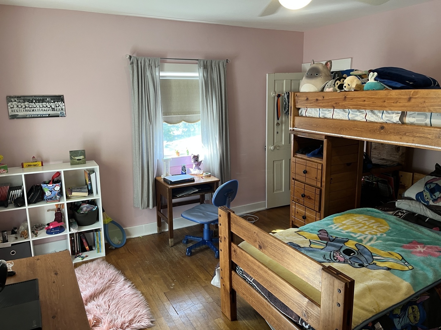 310 North Main Street Rankin, IL 60960 - Photo 12 of 17 a bedroom with a bed and a desk
