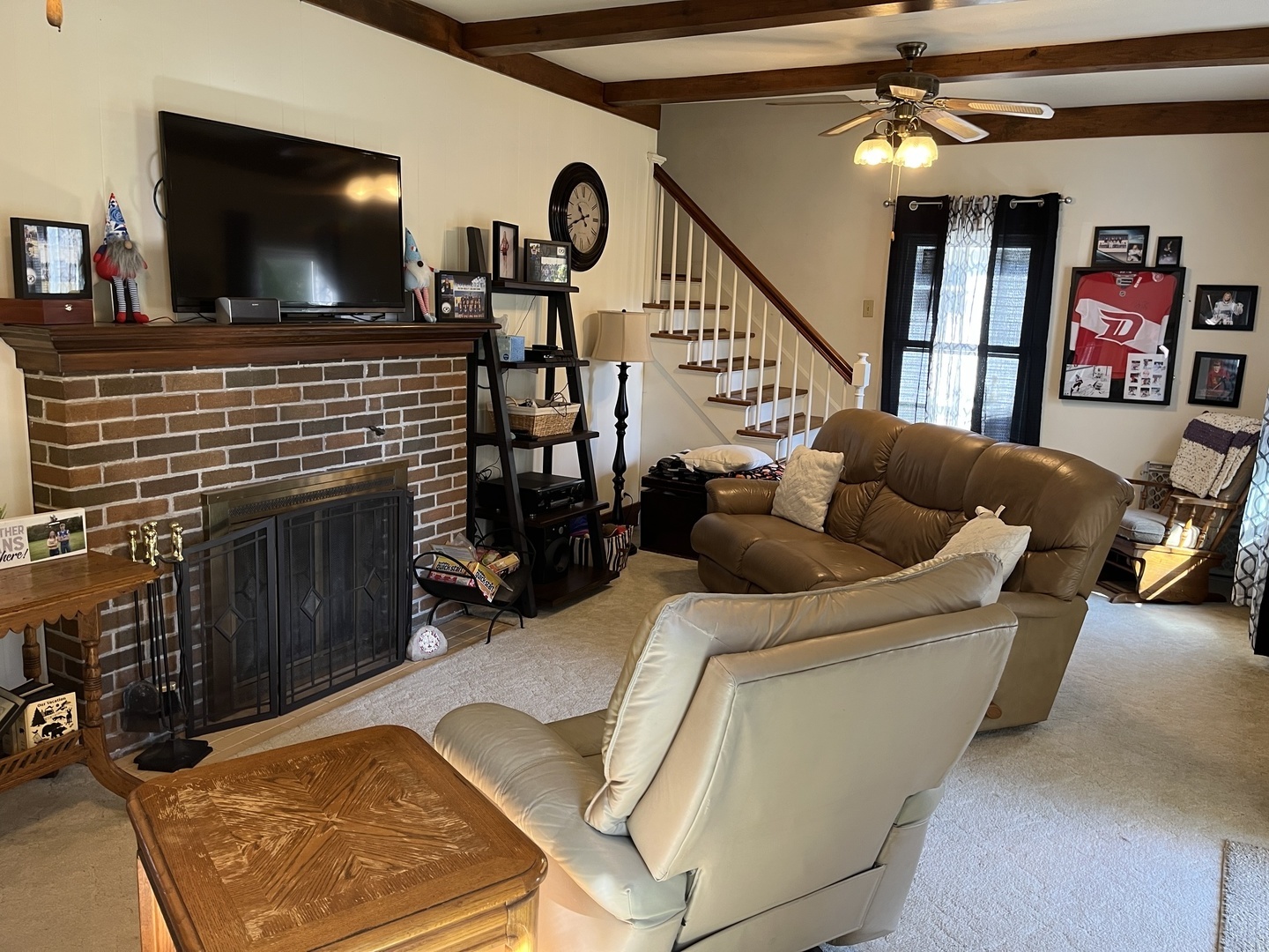 310 North Main Street Rankin, IL 60960 - Photo 3 of 17 a living room with furniture and a flat screen tv